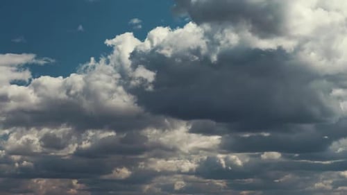 Cloudy Sky With Fluffy Clouds