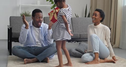 Little Girl Surprises Dad with a Birthday Gift