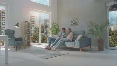 Couple connecting with their laptop