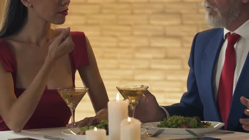 Woman and Man on Romantic Dinner Date