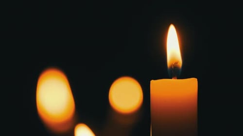 Candles Flame on Black Background