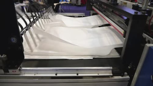 Automatic Production of Plastic Bags. Machine for Stacking Finished Products