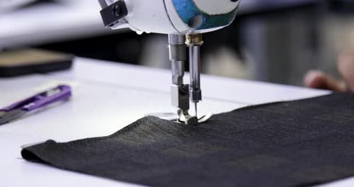 Sewing Machine Stitching Dark Fabric Close Up