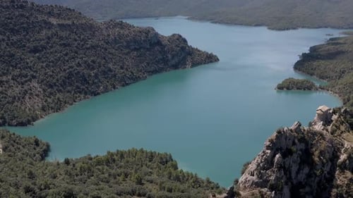 Picturesque rocky mountains near peaceful lake