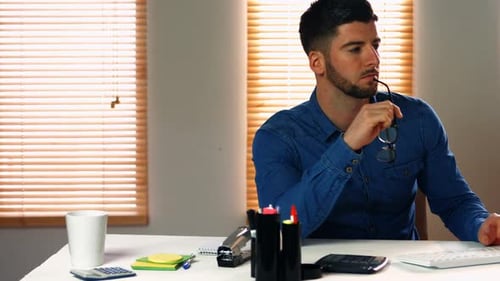 Male graphic designer working on computer