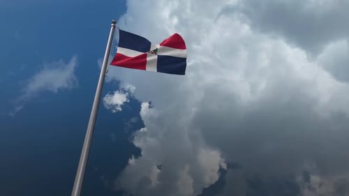 Dominican Republic Flag Waving Against Cloudy Sky