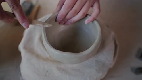 Clay Bowl Being Shaped by Hands