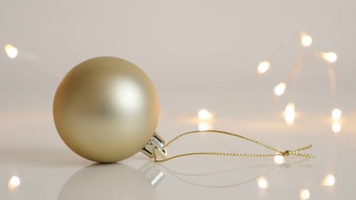Gold Christmas Ball Ornament with Glowing Lights