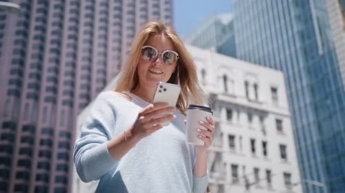 Smiling Mature Businesswoman Manager Holding Smartphone Standing at Office RED