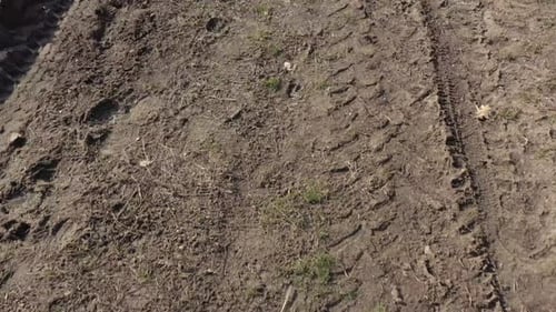 Above the muddy road after rain 4K drone footage