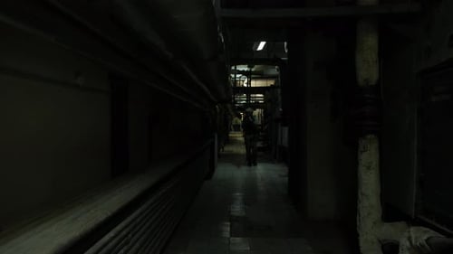 Special Agent in Camouflage Goes Through the Building with a Weapon. Fully Equipped Soldiers Wearing