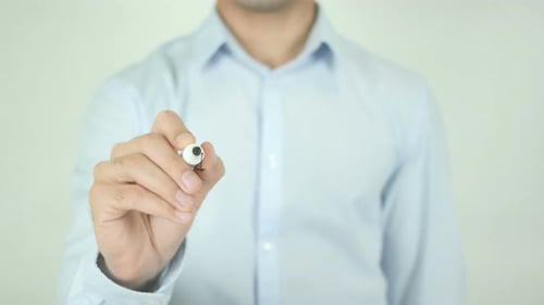 Man Writing Instructions on Screen