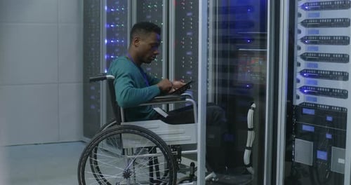 Technician Working in Data Center