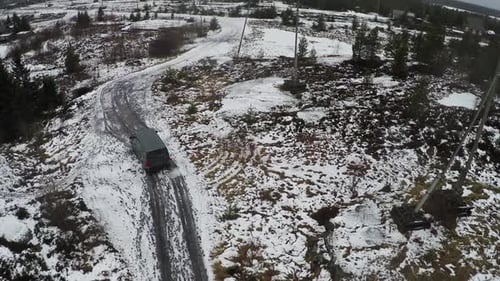 Car driving in northern town, aerial view