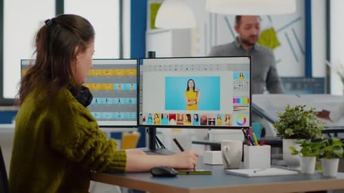 Female Photographer Edits Photos in Creative Media Agency Office