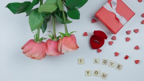 Romantic Engagement Ring with Red Roses and Gift