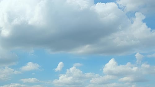 Clouds Moving Across Blue Sky Time Lapse