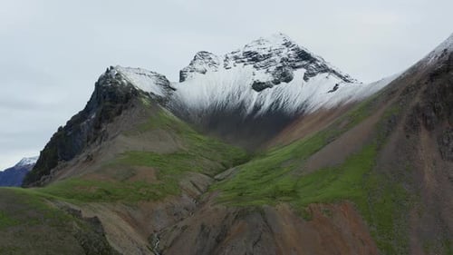 Drone Over Stream And Mountain Peak Of Vestrahorn Mountain