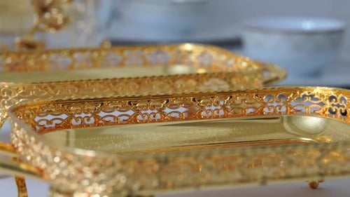 Ornate Gold Trays with Filigree Detailing