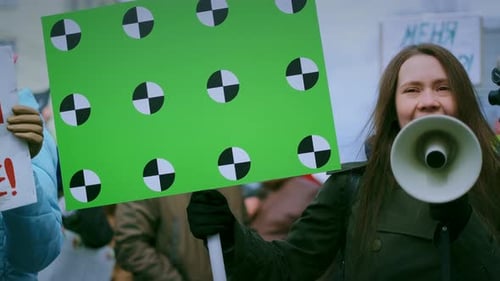 Woman with Megaphone at a Protest Demonstration