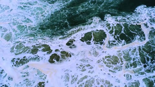 Foamy waves of blue sea