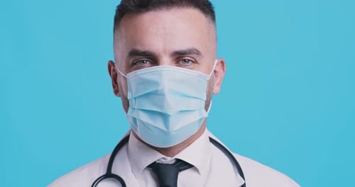 Doctor Wearing Mask in Close Up Shot