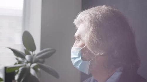 Portrait of Mature Businessman in Face Mask Posing for Camera in Office