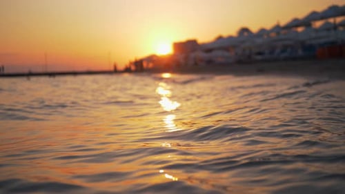 Summer Scene of Sea and Resort at Golden Sunset