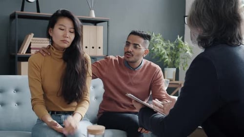 Couple in Therapy Session Hugging