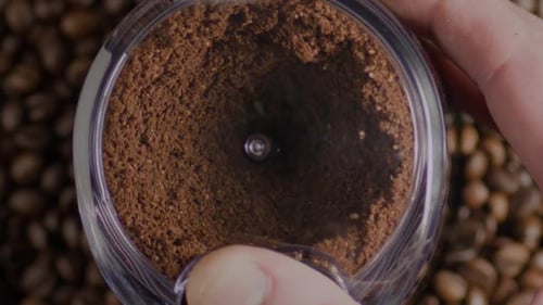 Top View Electric Grinder Preparing Coffee Powder Closeup