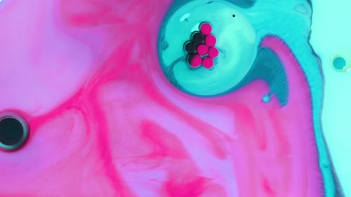 Abstract Colorful Liquids Mixing in Close Up