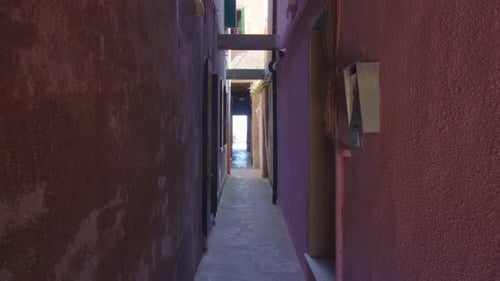 Narrow Lane Passage Between Bright Multicolored Houses