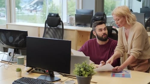 Business People Talking About Report
