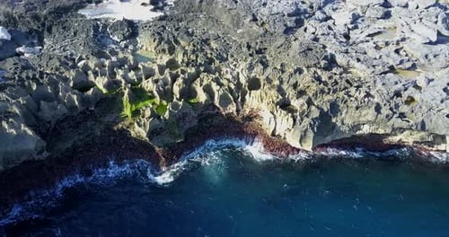 Aerial drone view of rocky tide pools coastline