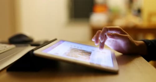 Hand Swiping on Touch Screen Tablet Close Up