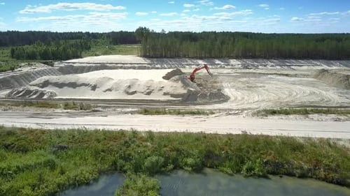 Lakes Near Sand Quarry with Modern Excavator Aerial View