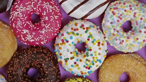 Colorful Donuts with Sprinkles and Icing