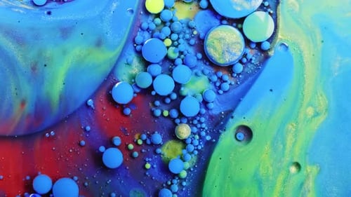 Colorful Liquids Forming Bubbles, Swirls, and Patterns