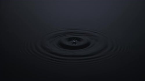 Dark Background with Expanding Ripples