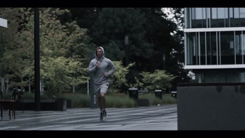 Adult Man Running in an Urban Environment