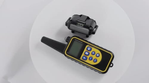 Collar and remote control for dog barking.