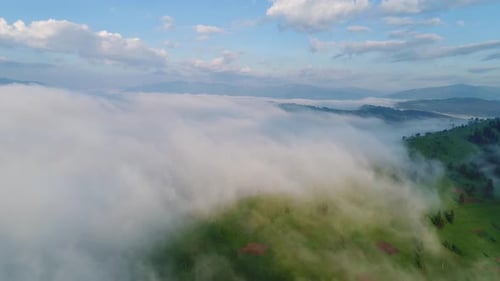 Scenic Mountains and Clouds Aerial View
