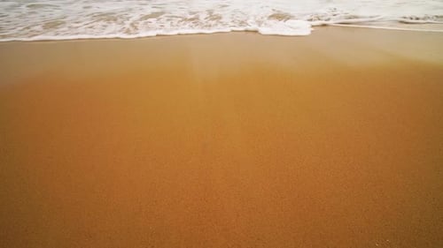 Meereswelle am Sandstrand