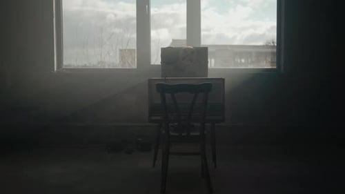 Old Tape Recorder with Open Reel in Dark Room