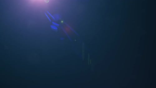 Anamorphische blaue optische Linsenblende bewegt sich nach unten