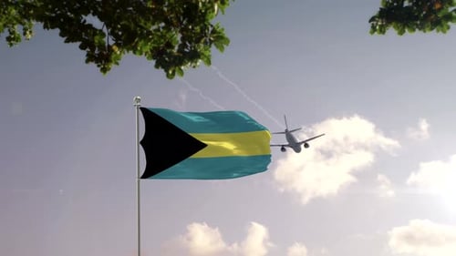 Waving Bahamas Flag, Flying Airplane, and Emerging Modern City