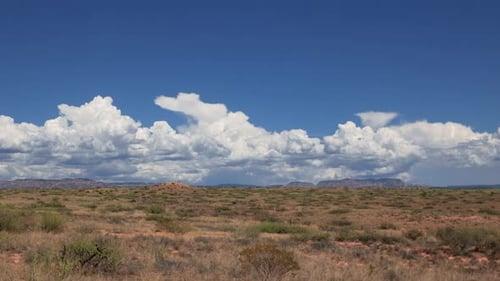 Desert Landscape with Clouds on a Sunny Day