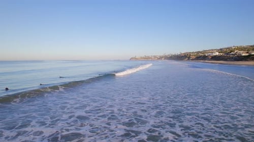 Surfers at Pacific Beach in the Early Morning in San Diego USA