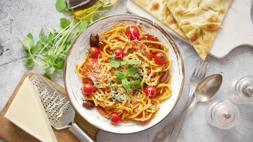 Delicious Pasta Dish with Tomatoes, Basil and Rustic Bread