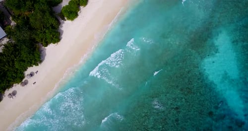 Tropical above abstract shot of a summer white paradise sand beach and blue ocean background